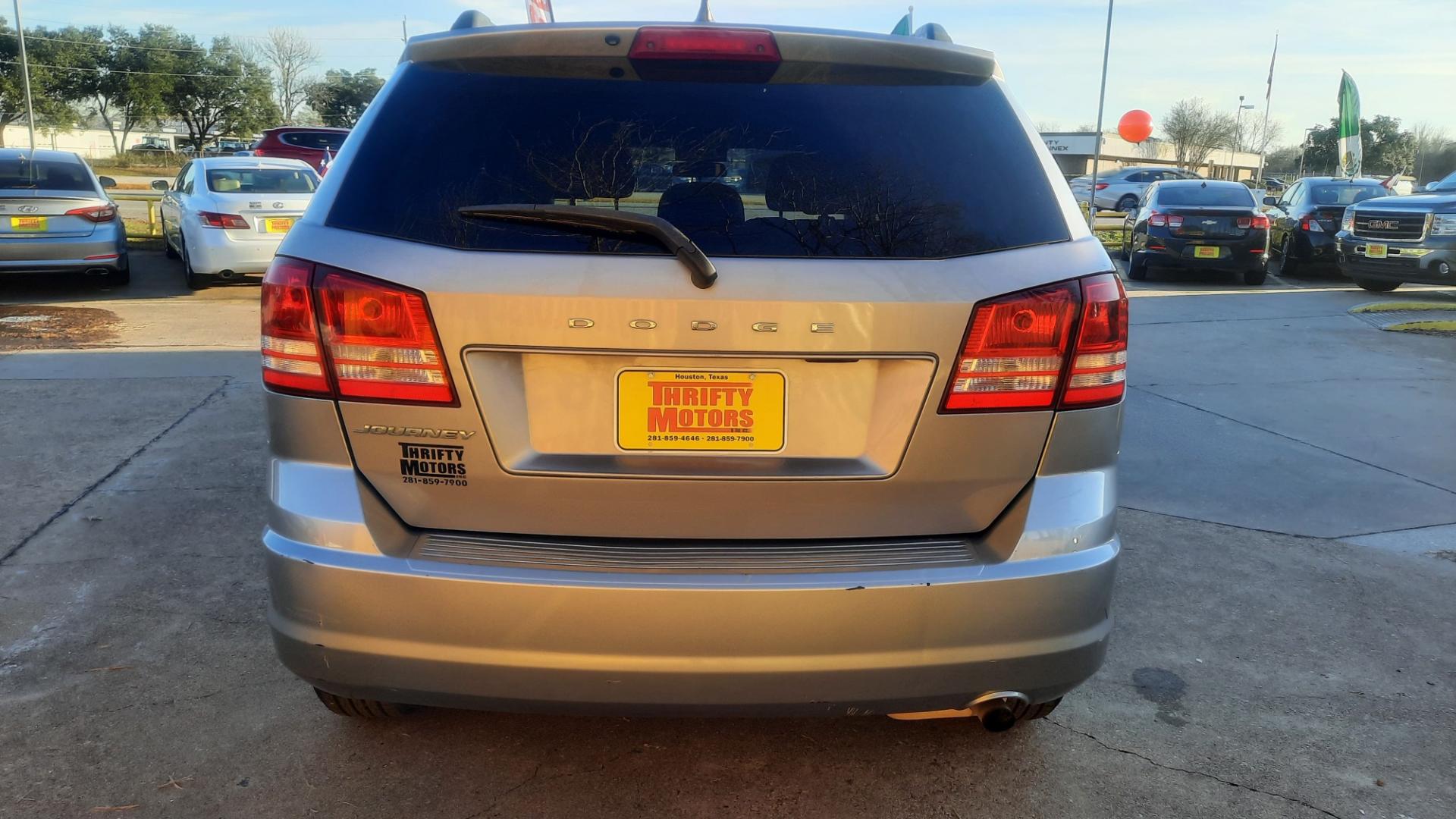 2018 Dodge Journey (3C4PDCAB8JT) , located at 16710 Clay Rd., Houston, TX, 77084, (281) 859-7900, 29.834864, -95.656166 - Photo#1